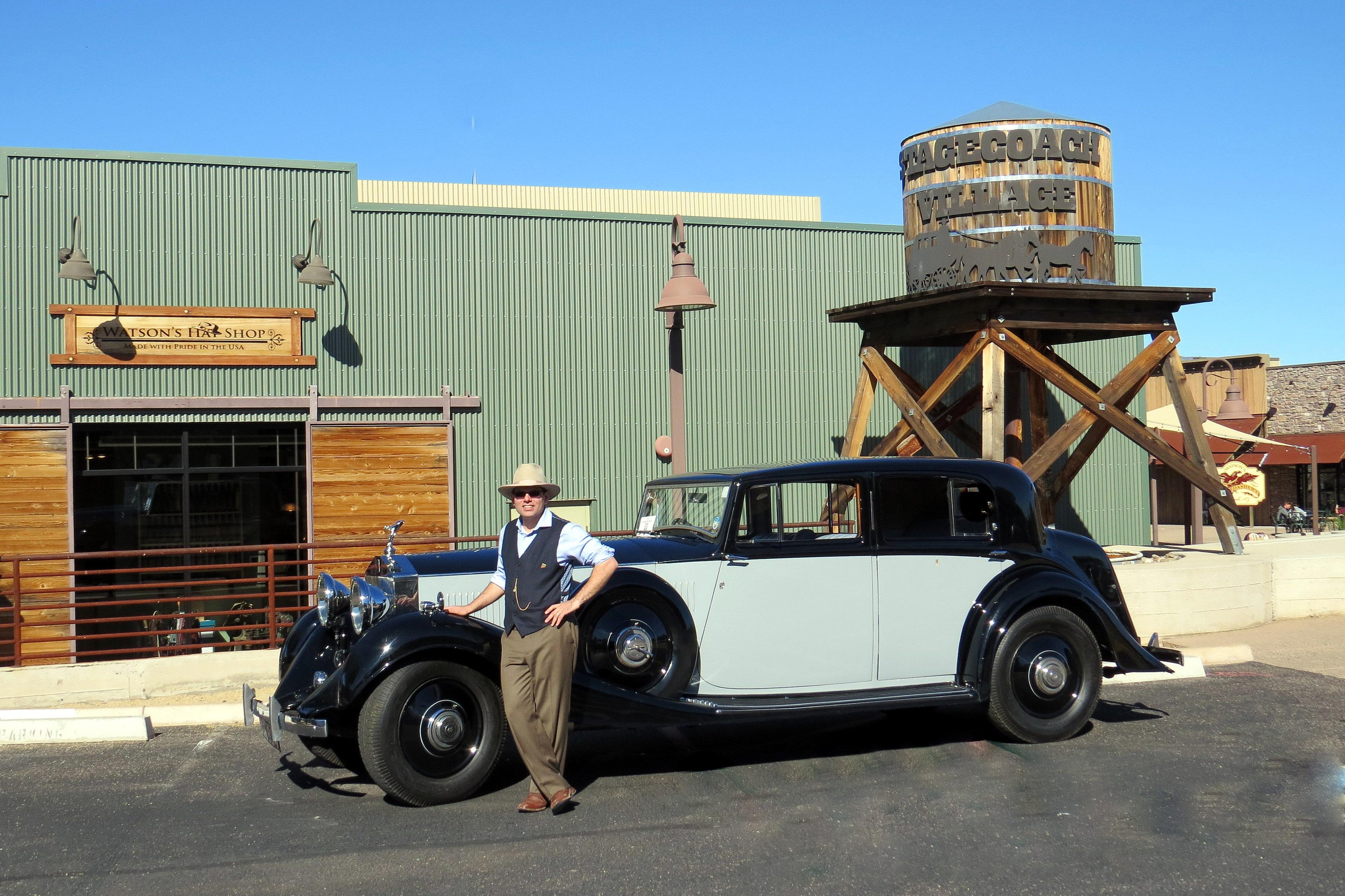 Watson’s Hat Shop eric watson and antique roadster at stagecoach village